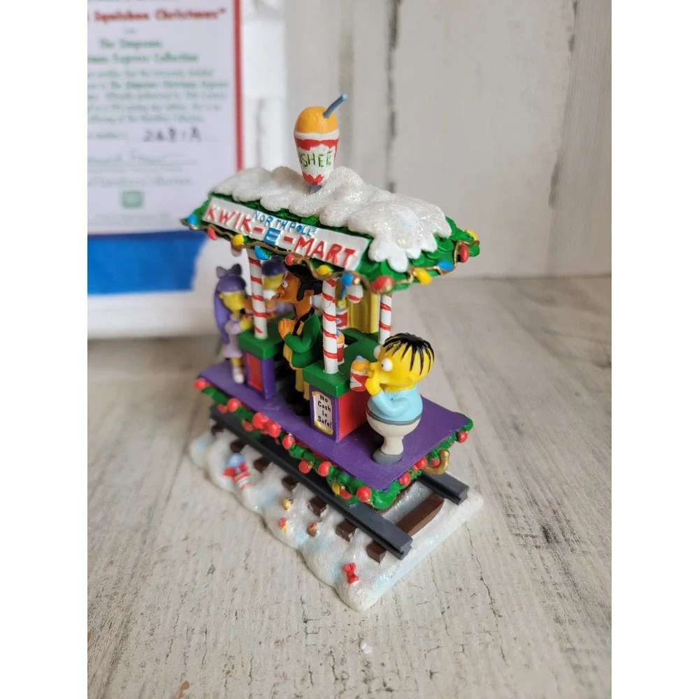 Hamilton Simpsons have a squishee Christmas kwik‎ e mart train apu Xmas vintage